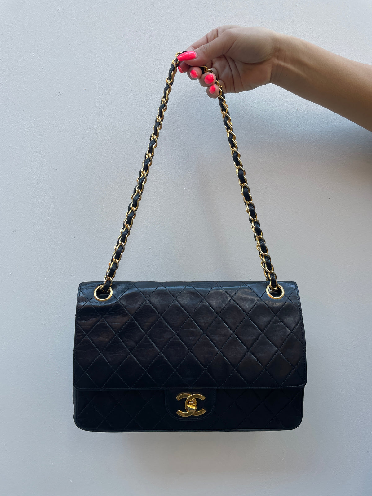 Chanel 1980s Black Lambskin Leather Classic Flap Bag with 24K Gold Plated Hardware