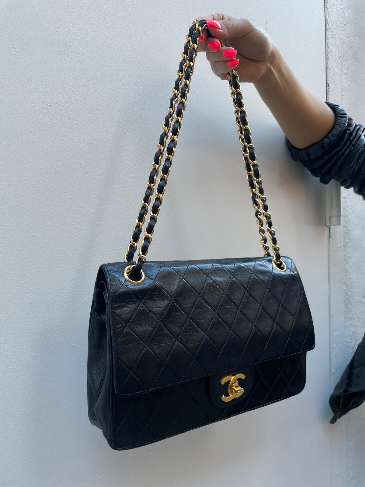 Chanel 1980s Black Lambskin Leather Classic Flap Bag with 24K Gold Plated Hardware