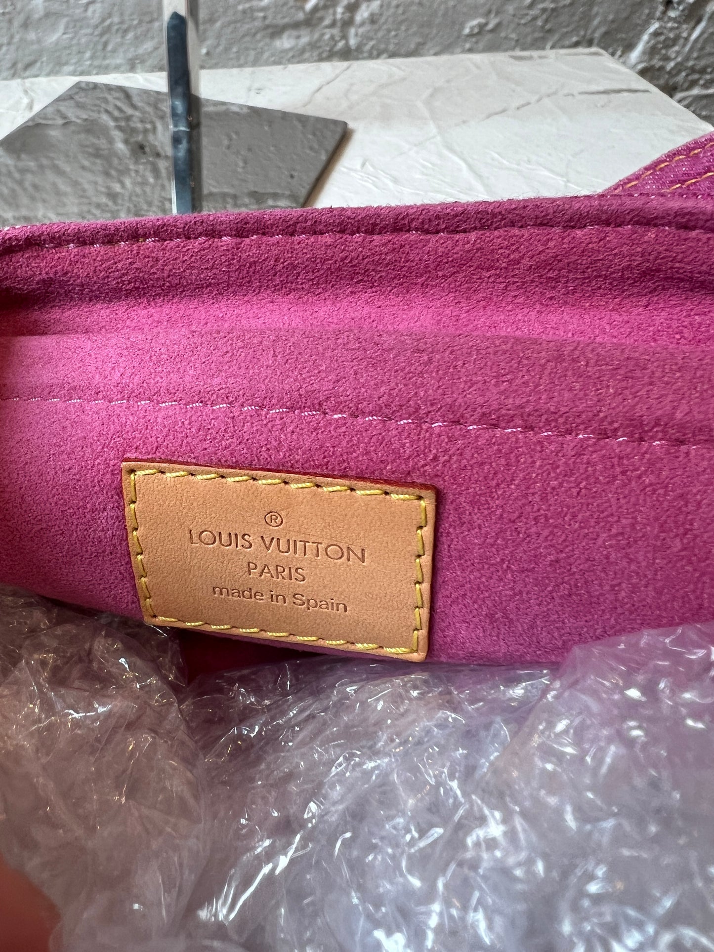 Louis Vuitton Denim Pleaty Handbag in Pink